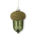 Decorative green acorn ornament with textured top on a white background