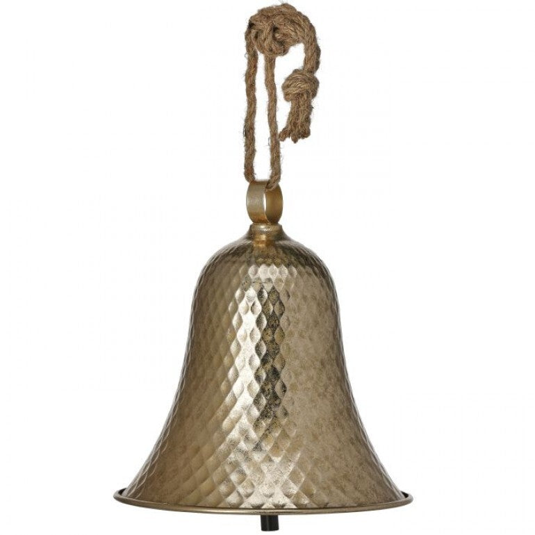 A hammered metal bell decoration in a warm antique gold finish, suspended by a knotted natural jute rope hanger against a plain white background.