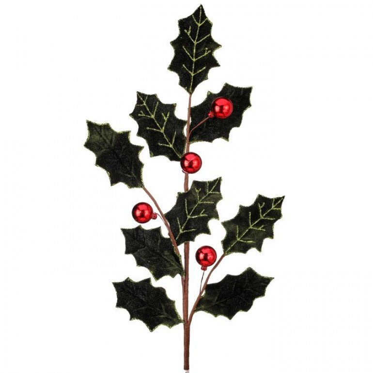 An artificial holly branch with dark green textured leaves, red berries, and brown stems on a plain white background.