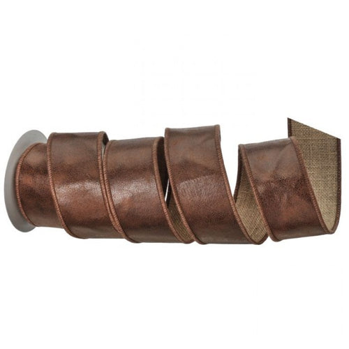 Brown ribbon spool on a white background